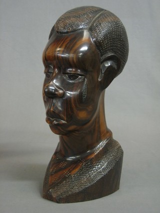 A carved African portrait bust 12"