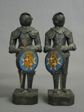 A pair of pressed metal figures of Maltese Knights in full armour 11"