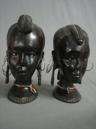 A pair of African portrait busts of ladies 10"