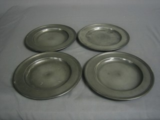 4 circular pewter plates the reverse with touch marks 8"