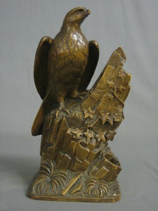 A carved figure of an Eagle on an outcrop incorporating a trinket box 14"