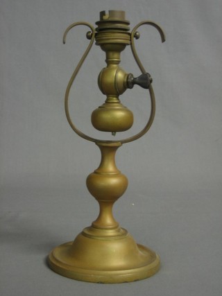A brass gimballed ships lamp converted to electricity