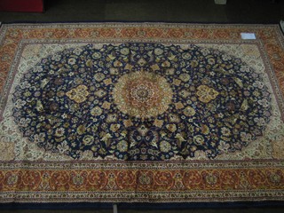 A contemporary blue ground and floral patterned Belgian cotton Madras style carpet 88" x 58"