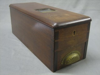 A rectangular mahogany till by Rudduck & Co