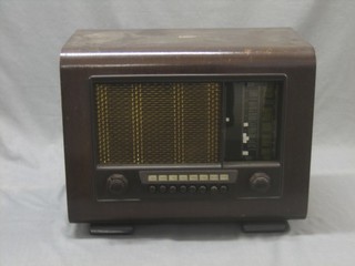 A Marconi radio contained in a walnut case