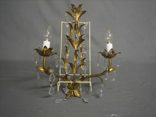 A gilt metal wall light bracket together with 2 matching brackets and 1 other (4)