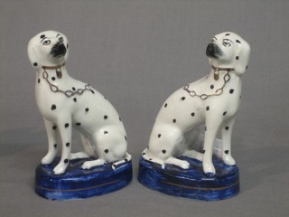 A pair of 19th Century Staffordshire figures of seated Dalmatians 5"