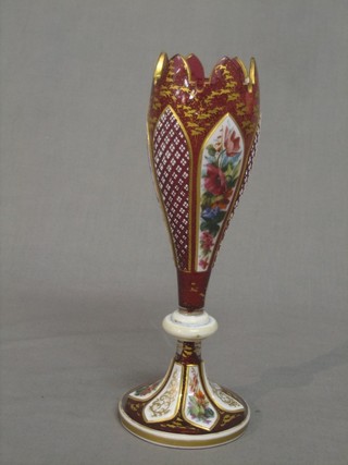 A 19th Century Bohemian red cut glass flower shaped vase with enamelled panels 8"