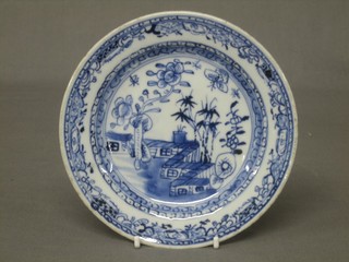An 18th/19th Century Oriental blue and white plate with garden decoration 6"