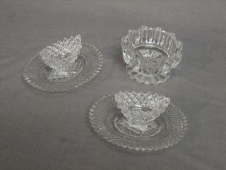 A pair of 19th Century boat shaped cut glass salts 3", raised on oval stands together with a circular ditto