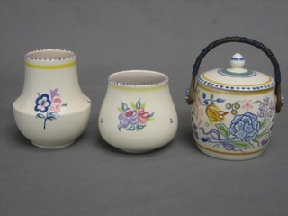 A circular Poole Pottery biscuit barrel and cover, the base with impressed Poole mark 4" (lid f) together with 2 circular Poole Pottery vases with dolphin mark 4" and 5 1/2"