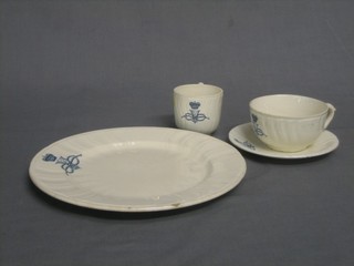 A circular Continental pottery plate decorated the Cypher of Victor Emanuel 9" (chip to rim) together with a matching cup and saucer (saucer cracked) and a coffee can (cracked)