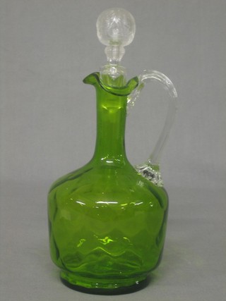 A 19th Century green glass ewer and stopper with clear glass handle 10"