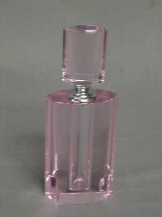 An oval pink tinted glass scent bottle and stopper 8"