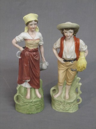 A pair of 19th Century biscuit porcelain figures in the form of a farm boy and girl 9"
