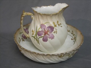 A Limoges 5 piece wash bowl set comprising wash bowl, jug, chamber pot, tooth brush pot and soap dish with floral decoration, retailed by Maple & Co