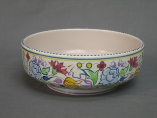 A circular Poole Pottery bowl the base with dolphin mark and impressed 682 9"