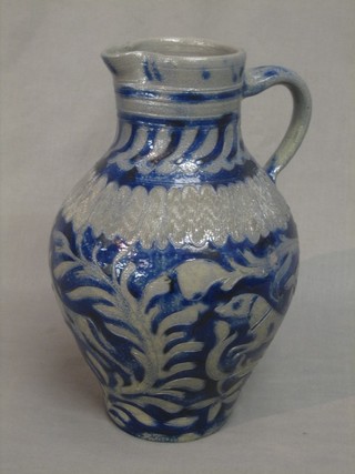 A German blue salt glazed jug decorated a hound 13"