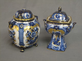 A square shaped Lotusware twin handled vase and cover 12" (chip to inner lid) and a similar circular twin handled dish (finial missing)