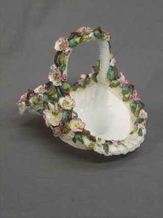 A 19th Century porcelain floral encrusted fruit bowl in the form of a basket 12"