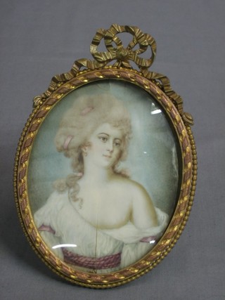 An 18th Century portrait miniature on ivory panel "Noble Woman" 4" contained in a gilt oval frame (crack to centre)