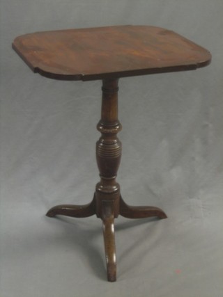 A 19th Century shaped mahogany snap top wine table, raised on a pillar and tripod base 21"