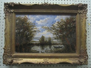 19th Century oil on board "Lake with Punt and a Two Arch Bridge" 9" x 14" contained in a decorative gilt frame