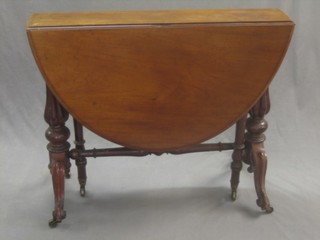 A Victorian oval mahogany Sutherland table raised on turned and fluted supports 35"