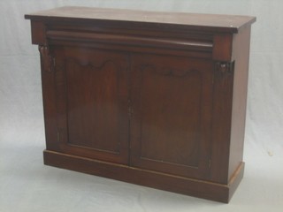 A Victorian mahogany chiffonier fitted 1 long drawer, the base with cupboard enclosed by panelled doors, raised on a platform base 42"