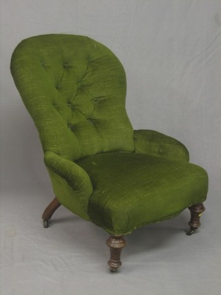 A Victorian iron and mahogany framed tub back chair, upholstered in green buttoned material