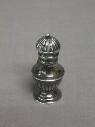 A Victorian silver pepperette with demi-reeded decoration Birmingham 1893