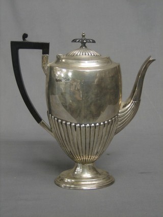 A Victorian silver coffee pot with demi-reeded decoration Sheffield 1894 by Walker & Hall, 24 ozs