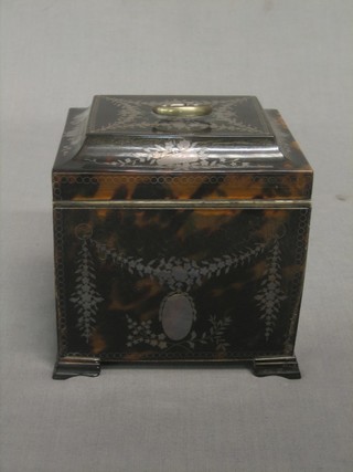 A handsome 19th Century tortoiseshell and inlaid jewel casket, with hinged lid and fall front, the interior fitted 2 drawers raised on ogee bracket feet 5"