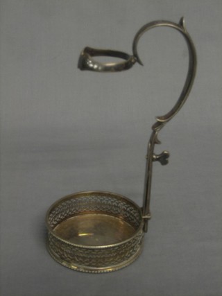 An Edwardian pierced silver plated wine bottle holder by Hewkin & Heath