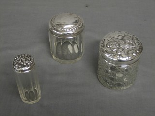 A cylindrical cut glass dressing table jar with silver lid 3", 1 other decorated Angels 3" and a pin jar 3"