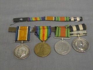 A group of 4 medals to 170763 Pte. W J Howell Machine Gun Corps, comprising British War medal, Victory medal, Defence medal and Service medal of the Most Venerable Order of St John of Jerusalem with 2 bars, together with a ribbon bar