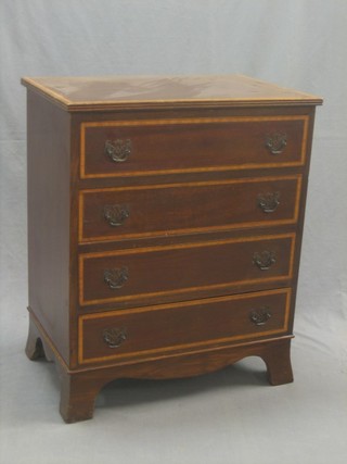 A Georgian style mahogany chest of 4 long drawers with satinwood and ebony cross banding, raised on bracket feet 24"