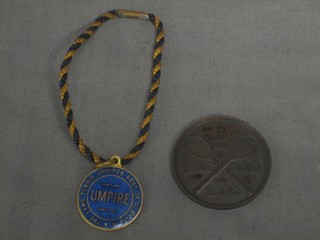 A blue enamel Lawn Tennis Umpire's Association badge no. 153 together with a bronze All England Lawn Tennis Association Umpire's souvenir medallion to Frank Hinton 1938
