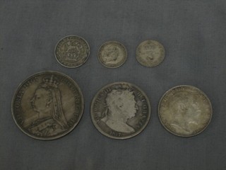 A George III 1817 half crown, a Victorian 1892 crown, an Edward VII 1903 florin, a George V silver sixpence and 2 silver threepences