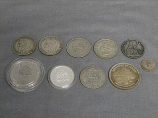 A George VI 1928 half crown, 6 other half crowns, a silver sixpence, a Jersey 25 pence coin, 2 other silver coins