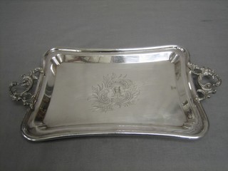 A Continental rectangular shaped silver plated twin handled tray marked Menese, 11"