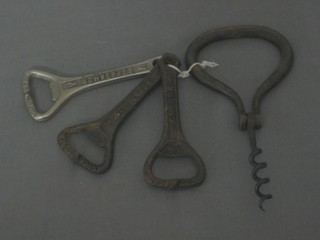 A 19th Century polished steel folding corkscrew together with 3 Schweppes bottle openers