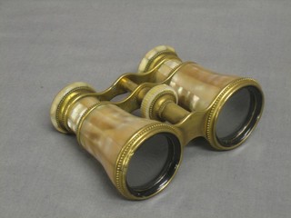 A pair of gilt metal and mother of pearl mounted opera glasses, marked L.M. Prince Paris