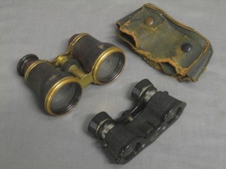 A pair of Kershaw opera glasses and 1 other pair (f)