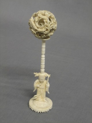A carved ivory puzzle ball 1"