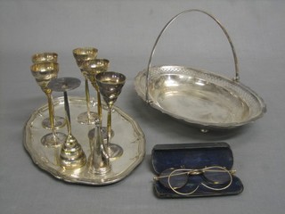 An oval pierced silver plated cake basket with swing handle, an oval silver plated dish and 6 silver plated goblets