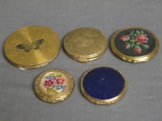 A lady's Zenette compact, a Kigu compact, a gilt Stratton compact and 1 others