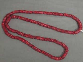 A string of red coral beads