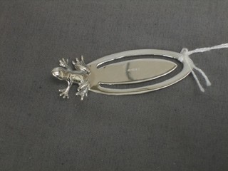 A modern silver book mark decorated a frog