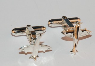 A pair of modern silver T bar cufflinks in the form of Spitfires